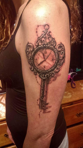 Tattoo Shop «Fat Cats Tattoos», reviews and photos, 111 State Rd NW, Warren, OH 44483, USA