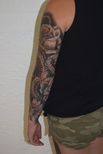 Explore kayak tattoo ideas, creative tattoo ideas in Sparta, available at Black Sheep Studios