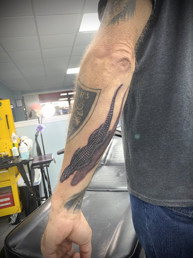 Explore flatline tattoo ideas, creative tattoo ideas in Ocala, available at Beauty in a Canvas Tattoo and Art Gallery