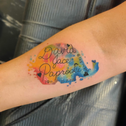 Explore photographer tattoo ideas, creative tattoo ideas in Hebron, available at Explosive Ink Tattoo