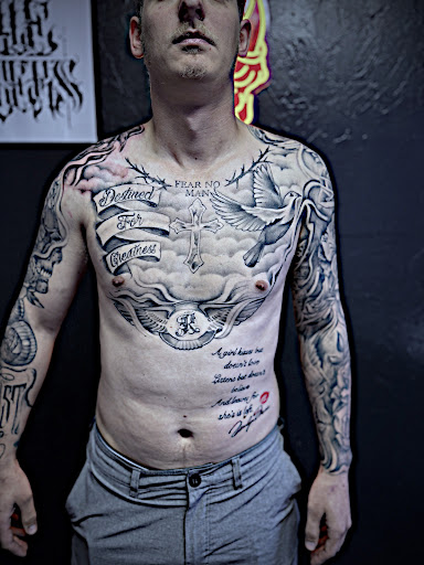 Explore tattoo ideas for athletes, creative tattoo ideas in Beaumont, available at Solid Black Ink Tattoo Parlor