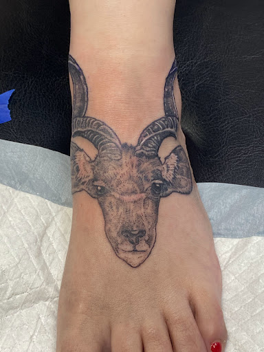 Explore dark tattoo cover up ideas, creative tattoo ideas in Aurora, available at Ronin Tattoo Studio INC