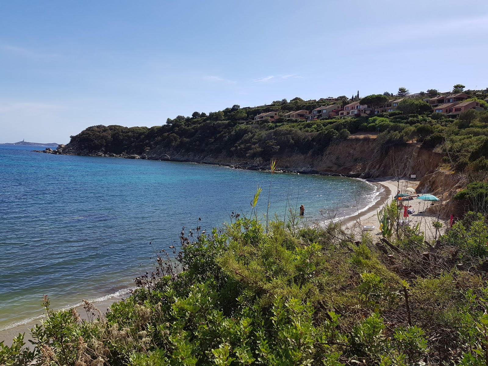 Foto von Porto Luna mit beiger sand Oberfläche