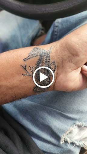 Explore cherub angel tattoo ideas, creative tattoo ideas in Sarasota, available at SEVEN SINS Tattoo Studio