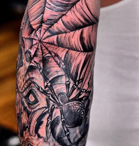 Explore tattoo ideas for women thigh, creative tattoo ideas in Homosassa, available at Citrus Tattoos