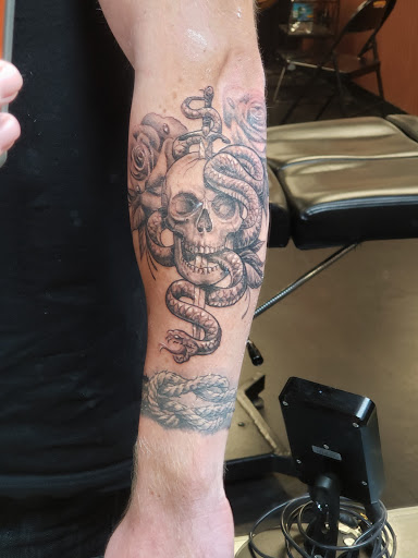 Explore monogram tattoo ideas, creative tattoo ideas in Saint Petersburg, available at Cthulhu Tattoo & Body Piercing