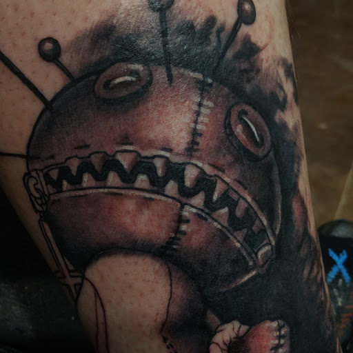 Explore small book tattoo ideas, creative tattoo ideas in Williston, available at Badlands Tattoo And Piercing