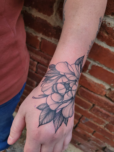 Explore good omens tattoo ideas, creative tattoo ideas in Kirksville, available at Nightshade Tattoo and Body Piercing