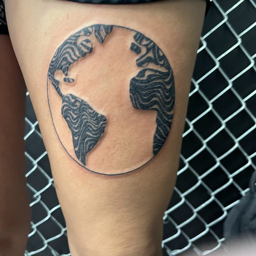 Explore floral tattoo cover up ideas, creative tattoo ideas in Buffalo, available at True Gloom Tattoo Studio