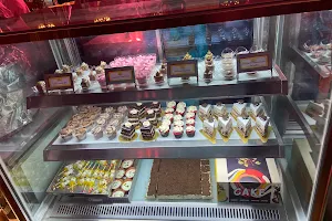 Cupcakes and More image