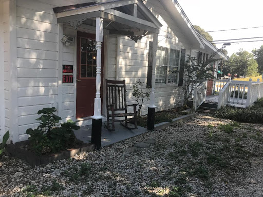 Explore hand tattoo cover up ideas, creative tattoo ideas in Lawrenceville, available at Steele Ink Studios Body Art