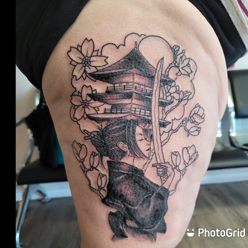 Explore dirt bike tattoo ideas, creative tattoo ideas in Tremonton, available at Ink Syndicate Tattoo Studio