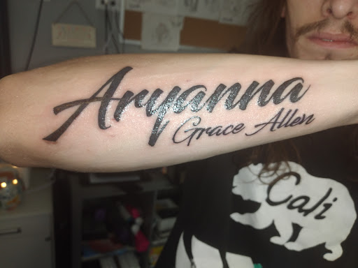Explore elbow tattoo ideas male, creative tattoo ideas in Kewanee, available at Splat Ink tattoos and piercings