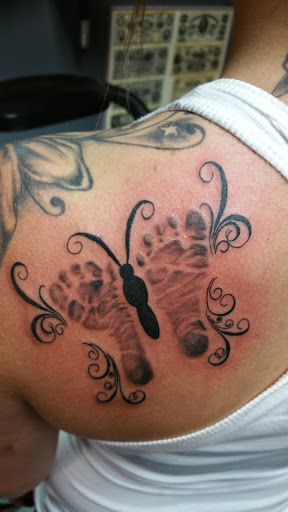 Explore lv tattoo ideas, creative tattoo ideas in Foley, available at Black Sheep Custom Tattoos and Piercings