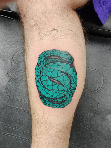 Explore forearm flower tattoo ideas, creative tattoo ideas in Saint Paul, available at St Paul Tattoo