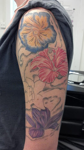 Explore bikini tattoo ideas, creative tattoo ideas in Pelham, available at Tattoo Fever