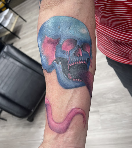 Explore rolling stones tattoo ideas, creative tattoo ideas in Los Alamitos, available at Mr. Inkwells Classy Tattoos
