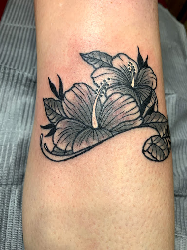 Explore motorbike tattoo ideas, creative tattoo ideas in Cape Coral, available at UNRIVALED INK