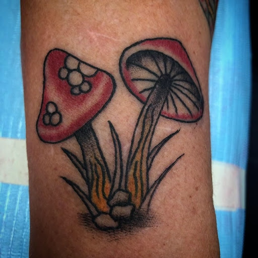 Explore inner ear tattoo ideas, creative tattoo ideas in Ferndale, available at Signature Tattoo