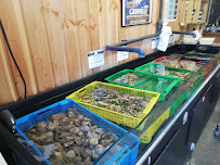 Atmosphère du Bar-restaurant à huîtres Les Huîtres Du Père Gus. Producteur d'huîtres Normandes à Blainville-sur-Mer - n°16