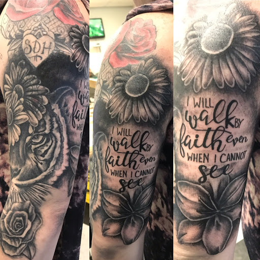 Explore tramp stamp tattoo cover up ideas, creative tattoo ideas in Evans Mills, available at Undeniable Ink