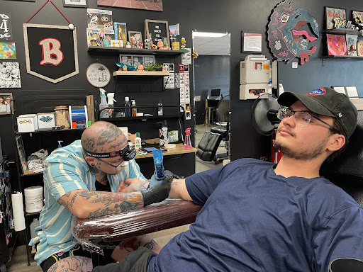 Explore 2 child tattoo ideas for dad, creative tattoo ideas in Bradley, available at The 22 Tattoo Company