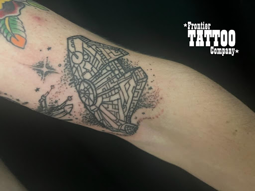 Explore book dragon tattoo ideas, creative tattoo ideas in San Tan Valley, available at Frontier Tattoo Company