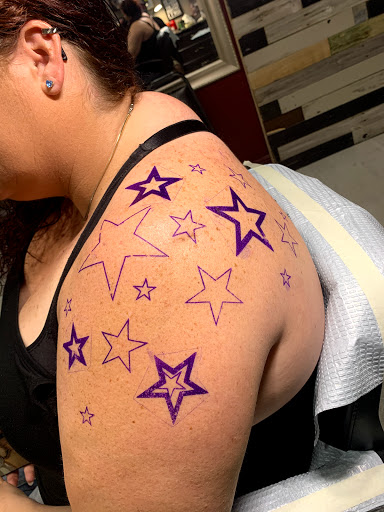 Explore finger word tattoos ideas, creative tattoo ideas in Cape Coral, available at UNRIVALED INK