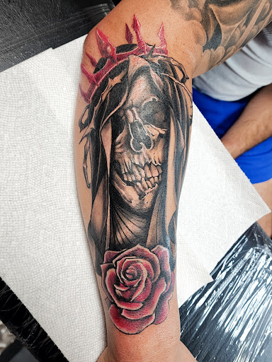 Explore race car tattoo ideas, creative tattoo ideas in Columbus, available at Broken Tarot Tattoo Parlour