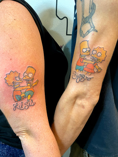 Explore vertical tattoo ideas, creative tattoo ideas in Russellville, available at AR Ink