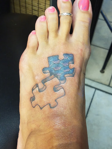 Explore mens wrist tattoo ideas, creative tattoo ideas in Myrtle Beach, available at Elite Ink Tattoos of Myrtle Beach