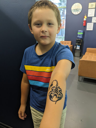Explore sideburn tattoo ideas, creative tattoo ideas in Destin, available at Atomic Frog Tattoo
