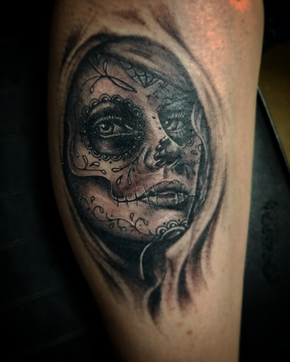 Explore tattoo ideas with son's name, creative tattoo ideas in Warren, available at Metal Moon Tattoo