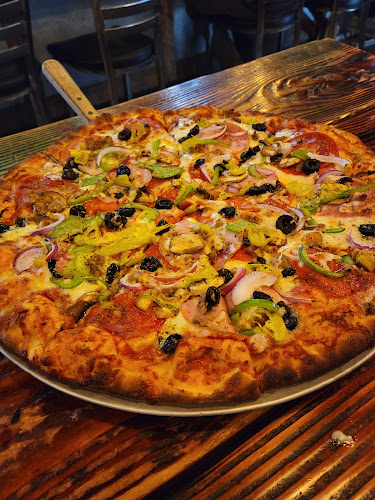 Best Wood Fired pizza place in Bend - Backyard Brick Oven Pizza & Sports Pub