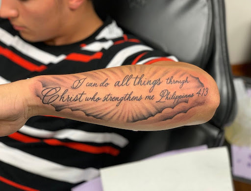 Explore happiness tattoo ideas, creative tattoo ideas in Fort Wayne, available at Grade A Tattoos and Body Piercing