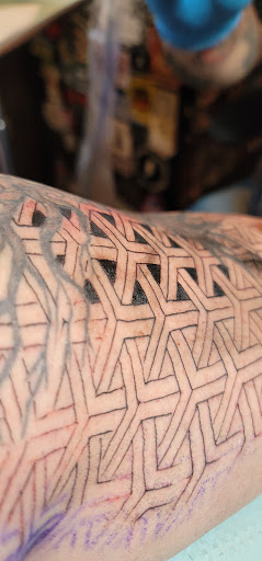 Explore batman tattoo ideas, creative tattoo ideas in Grand Rapids, available at Sovereign Arms Tattoo