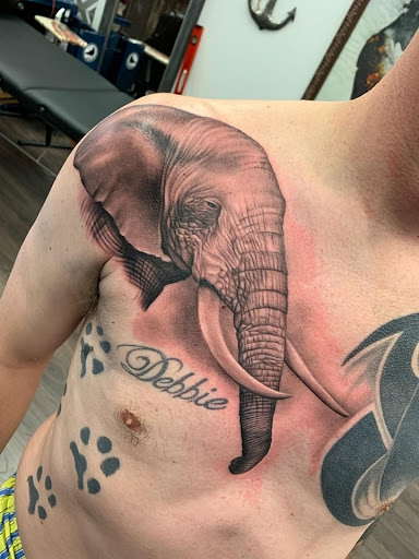 Explore unique tattoo ideas men, creative tattoo ideas in Utica, available at Red Raven Tattoo and Body Piercing