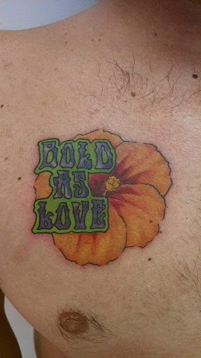 Explore mother tattoo ideas for men, creative tattoo ideas in Bowling Green, available at Taboo Tattoos and Piercings