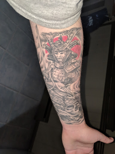 Explore father and son matching tattoo ideas, creative tattoo ideas in Phoenixville, available at Grace Tattoo