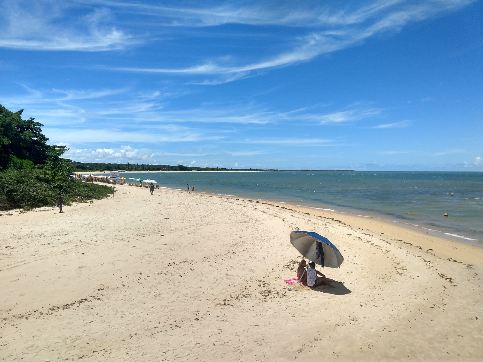 Zdjęcie Praia De Santo Andre z powierzchnią jasny, drobny piasek