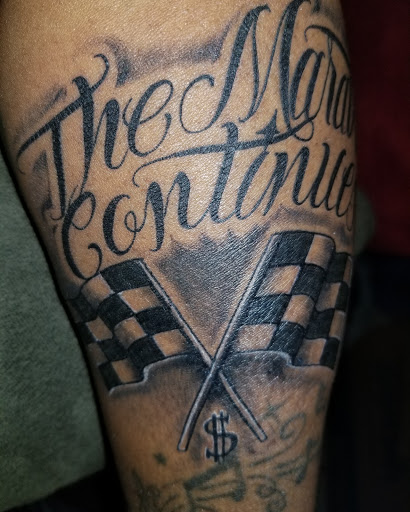 Explore athletic tattoo ideas, creative tattoo ideas in Los Angeles, available at Stigma Tattoo and Piercings Inc.
