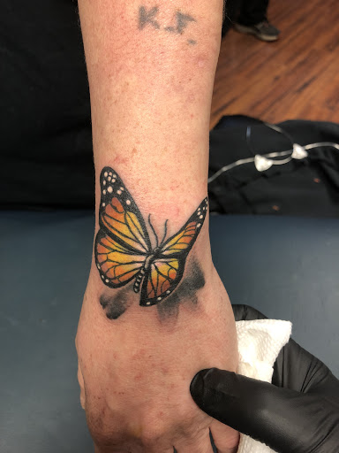 Tattoo Shop «The Greater Good Tattoo», reviews and photos, 105 E High St, Ashley, OH 43003, USA