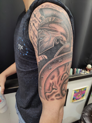 Explore broken heart tattoo ideas, creative tattoo ideas in Rogers, available at Jimmy Romance Tattoo & Body Piercing