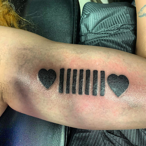 Explore crown tattoo ideas for guys, creative tattoo ideas in Hudson Falls, available at ALTERED ADDICTION TATTOOS