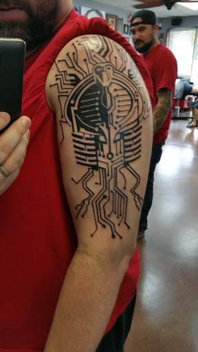 Explore origami tattoo ideas, creative tattoo ideas in Arlington, available at Urbans Tattoo & Piercing Studio