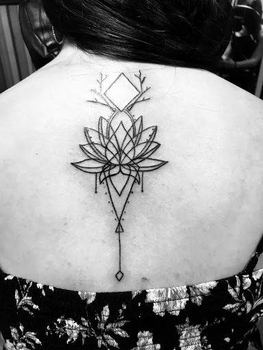 Explore flower foot tattoo ideas, creative tattoo ideas in Shreveport, available at Legacy Ink Tattoo Studio