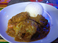 Poulet au curry du Restaurant de spécialités d'Afrique de l'Ouest Le Village à Paris - n°10