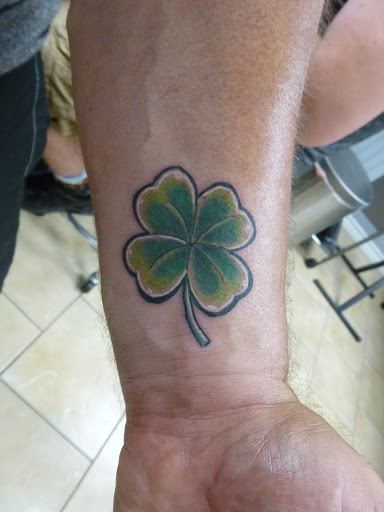 Tattoo Shop «magnum opus tattoo company», reviews and photos, 1817 Padre Blvd #4, South Padre Island, TX 78597, USA