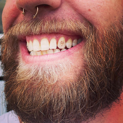 Explore tattoo ideas for your kids, creative tattoo ideas in Kissimmee, available at Ol Skool Tattoos Studio