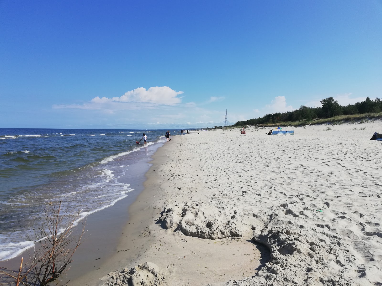 Foto van Krynica Morska ent 19 met helder zand oppervlakte